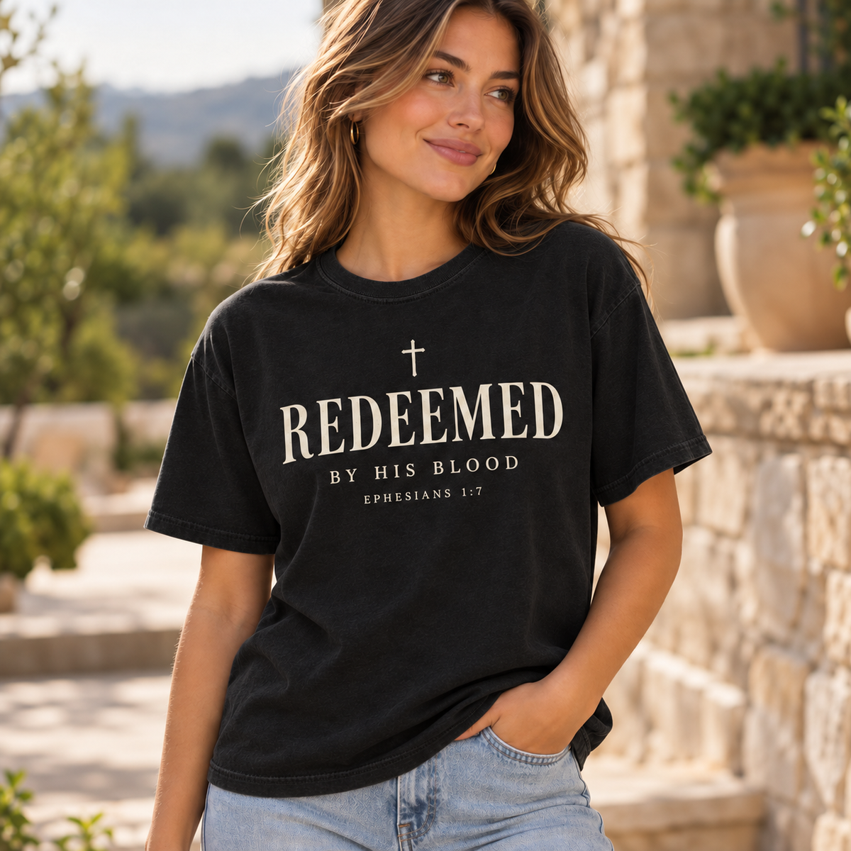 Obiatar Redeemed by His Blood Christian graphic T-shirt Black on model